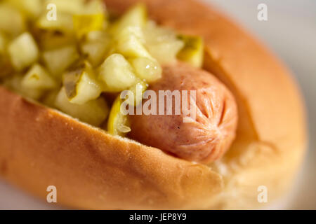 turkey hot dog served on a bun and topped with green pickle relish Stock Photo