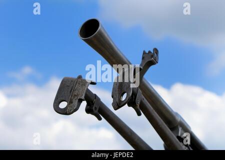 Close up of barrel and tripod legs of a light machine gun Stock Photo