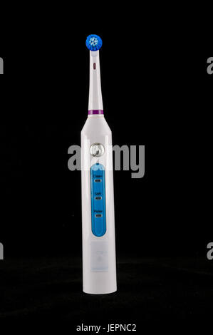 One electric toothbrush, macro, isolated on a white background Stock