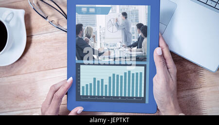 Composite image of screen with graphs Stock Photo