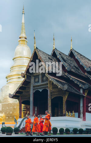 Wat Phra Singh temple with monks Stock Photo