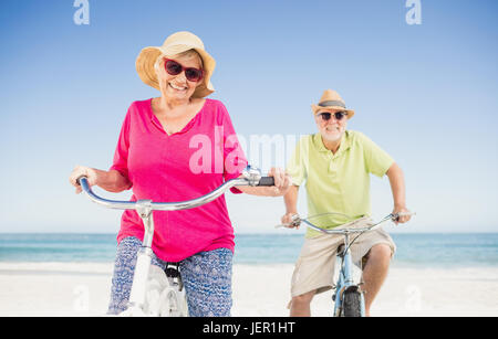 Senior couple going for a bike ride Stock Photo