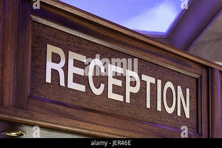 Old sign of reception in a hotel, detail of information for tourists Stock Photo