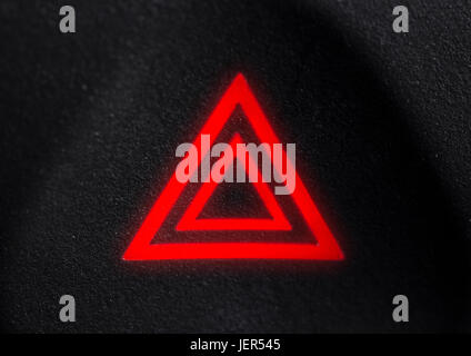 The symbol of an emergency stop of the car lights on a black background Stock Photo