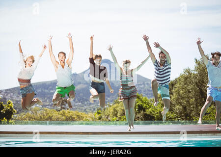 Group of friends jumping in mid air Stock Photo - Alamy