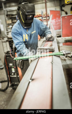 Man working in workshop Stock Photo
