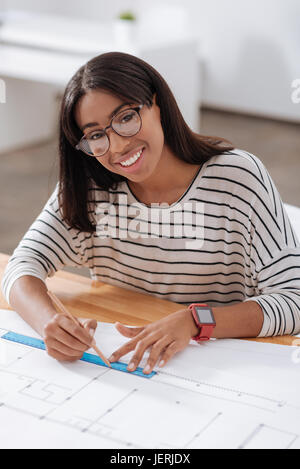 Professional female engineer using drawing tools Stock Photo