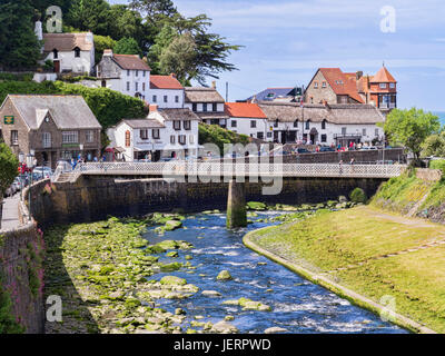 12 June 2017: Lynmouth, Devon, England, UK - A view of the River Lyn and Mars Hill on a sunny summer day at Lynmouth, North Devon, England, UK. Stock Photo