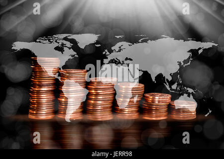conceptual image of coins and world map Stock Photo