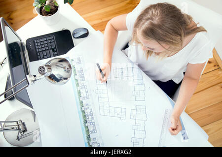 Top view at architect's desk where architect is working Stock Photo