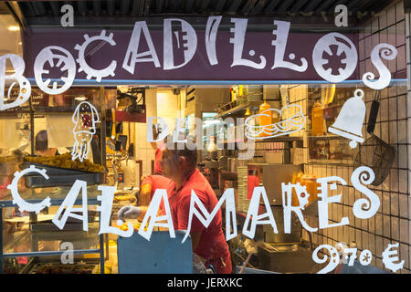 Shop selling Calamares bocadillos, or fried squid in rolls  near the Plaza de Santa Ana, in the center of Madrid. Spain Stock Photo