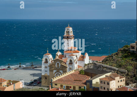 Basilica de Candelaria and Guanche statues at ocean shore Stock Photo