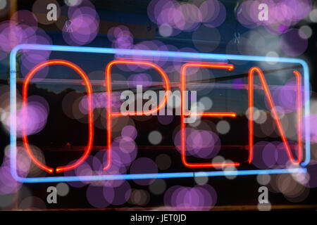neon open sign on storefront Stock Photo
