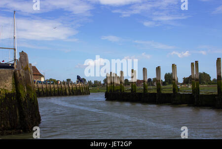 The dredged deep water channel and quayside at Bosham Harbour in West Sussex England Stock Photo