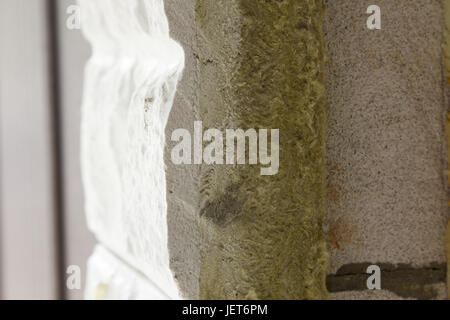 Thermal insulation of a house wall on a building site Stock Photo