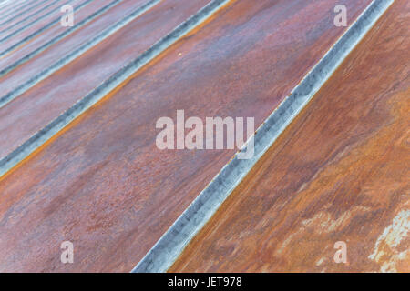 Old rusty iron metal roof. Stock Photo