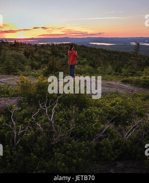 Traveler at mountain top Stock Photo