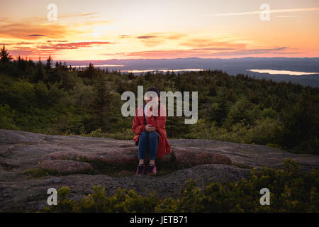 Traveler at mountain top Stock Photo