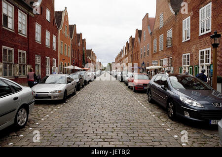 Germany, Brandenburg, Potsdam, Dutch fourth, street, gabled houses, pedestrians, town, town fourth, residential district, cobblestones, brick buildings, residential houses, restores, live, shops, architectural style, brick, red, gable, sidewalk, street lamp, cars, park, people, tourists, tourism, Stock Photo