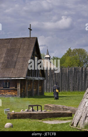 Canada, Ontario, Midland, Sainte-Marie among the Hurons, timber houses, churches, man, go, back view, no model release, Stock Photo