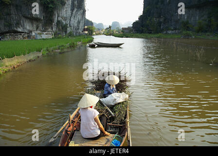 Asia, Vietnam, women on an oar boot, Stock Photo