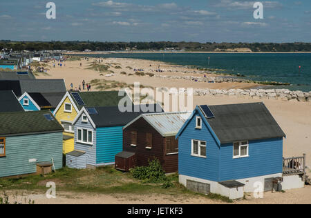 Mudeford Sandbank beach or Spit with Beach Huts on the shore, from Hengistbury Head, Dorset, UK Stock Photo