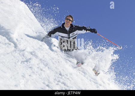 Skier in action, Skifahrer in Aktion Stock Photo