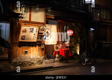 KYOTO, JAPAN - CIRCA APR, 2013: Typical Kaiseki restaurant is in Gion district at night time. Hanamachi is a Japanese geisha district with various oki Stock Photo