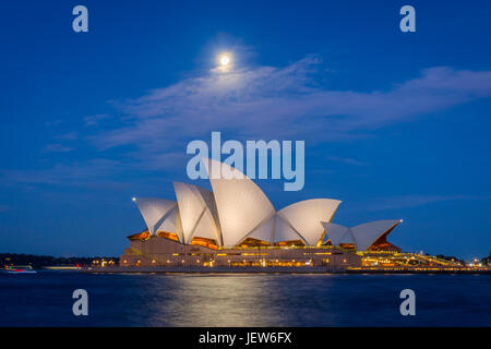 View on Sydney Opera house with moon at night, long exposure Stock Photo