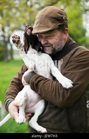 Hunter with hunting dog Stock Photo