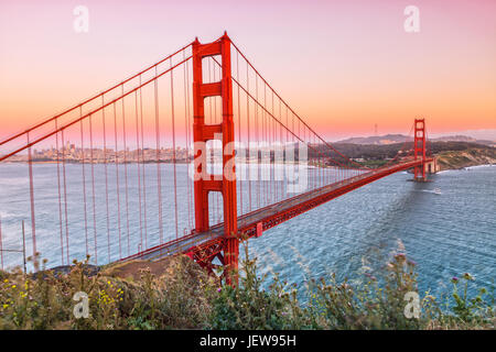 Golden Gate Bridge in San Francisco while the Sun is going down Stock Photo