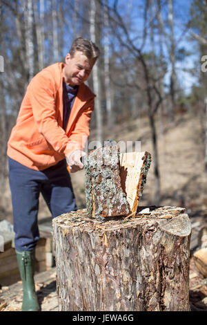 Man chopping wood Stock Photo
