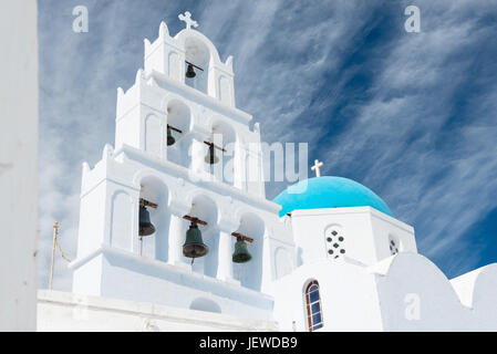 Blue church with dome and bells tower in Pyrgos, Santorini island, Greece Stock Photo