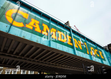 Old railway bridge over Chalk Farm Road at Camden Lock featuring a 'trompe l'oeil' image by artist John Bulley, London, UK Stock Photo