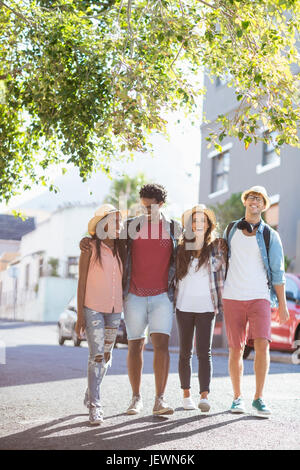 Friends walking together and fun together Stock Photo
