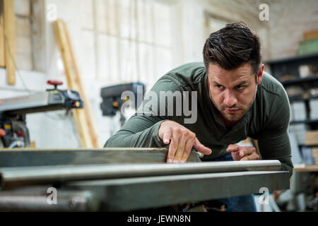 Carpenter working on his craft Stock Photo