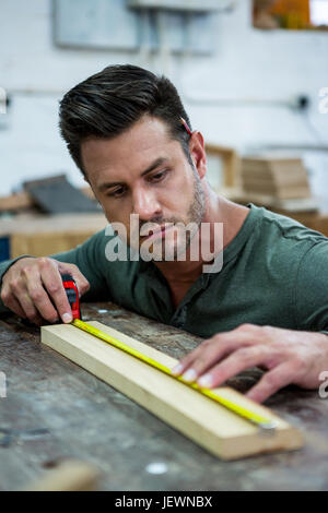 Carpenter working on his craft Stock Photo