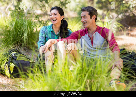 Couple taking a break during a hike Stock Photo