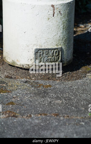 The foot of a classic Victorian-style Revo Tipton street light, showing the manufacturer's logo. Stock Photo