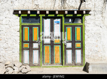 Colorful entrance door of a Tibetan house, Upper Mustang, Nepal. Stock Photo