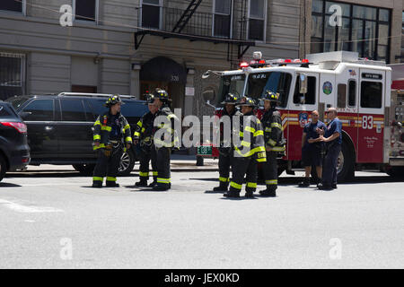 New York, USA. 27th June, 2017. Rescuers stand by near the site of a subway derailment in Harlem, New York, the United States, on June 27, 2017. At least 34 people were injured from a subway derailment in upper Manhattan of New York City Tuesday morning, fire officials said. Credit: Xu Keshuang/Xinhua/Alamy Live News Stock Photo