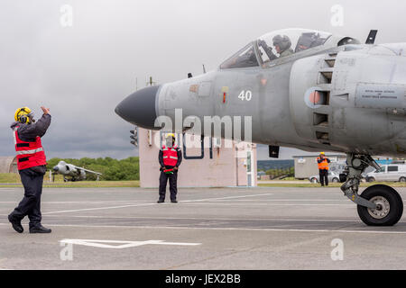 Official Media Assignment at RNAS Culdrose, Helston, Cornwall, UK. 27th June, 2017. Aircraft , Aircraft Handler instructors on the dummy deck facility marshall a Sea Harrier at RNAS Culdrose. The Sea Harriers are used to simulate 'live deck' conditions on aircraft carriers such as HMS Queen Elizabeth Credit: Bob Sharples/Alamy Live News Stock Photo