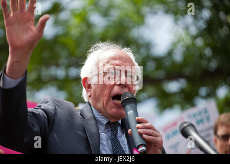 Washington, DC, USA. 27th June, 2017. Ahead of the US Senate AHCA vote (American Health Care Act), hundreds gather on capitol hill to protest Republican provisions related to women's healthcare, including many senators working to delay the vote on Trumpcare. Senator Bernie Sanders speaks to protesters, promising to delay the GOP Health Care vote. Credit: B Christopher/Alamy Live News Stock Photo