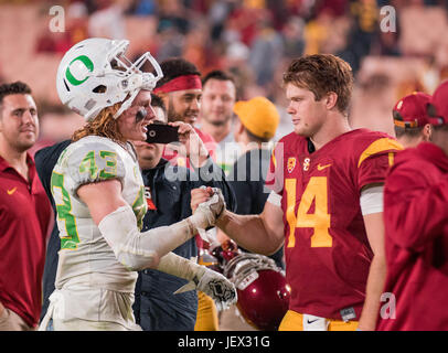 Los Angeles, CA, USA. 05th Nov, 2016. USC quarterback (14) Sam Darnold talks to (43) Brenden Schooler of Oregon after the Oregon vs USC football game on Saturday, November 5, 2016 at Los Angeles Memorial Coliseum in Los Angeles, California. USC defeated Oregon 45-20.(Mandatory Credit: Juan Lainez/MarinMedia.org/Cal Sport Media) (Complete photographer, and credit required) Credit: csm/Alamy Live News Stock Photo