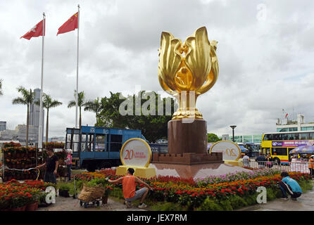 Hong Kong, China. 27th June, 2017. Workers prepare a flower bed at the Golden Bauhinia Square in Hong Kong, south China, on June 27, 2017. July 1, 2017 marks the 20th anniversary of Hong Kong's return to the motherland. Credit: Liu Yun/Xinhua/Alamy Live News Stock Photo