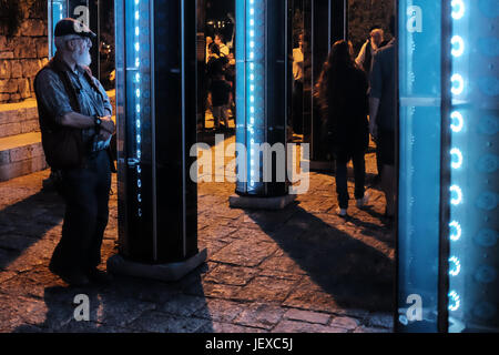 Jerusalem, Israel. 28th June, 2017. Visitors enjoy 'Cathedral of Mirrors' by Mads Christensen of Denmark, commissioned by Quays Culture UK in the Old City. Jerusalem launched its 9th International Festival of Light displaying illuminated art installations created by local and international artists. Credit: Nir Alon/Alamy Live News Stock Photo