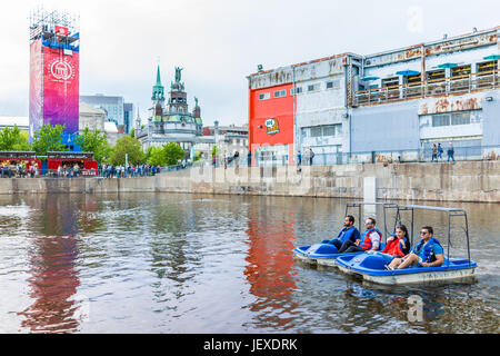 Montreal, Canada - May 27, 2017: Old port Bonsecours market basin area with boats in city in Quebec region during sunset Stock Photo