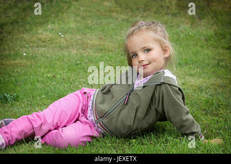 Young girl posing in park Stock Photo