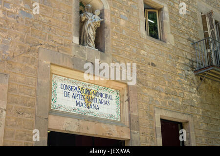 Facade of main entrance to old Massana School in Raval, Barcelona, Spain. Stock Photo