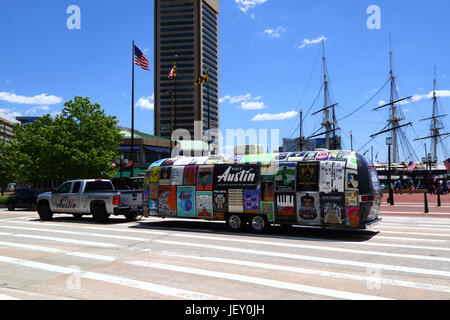 Pickup truck towing Airstream camper promoting Visit Austin tourism campaign, Inner Habor, Baltimore, Maryland, USA Stock Photo